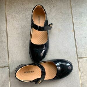 Black dressing shoes for girls .